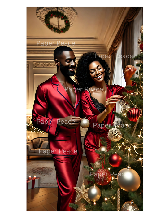 Happy Black Couple Decorating Christmas Tree in Red Satin Pajamas